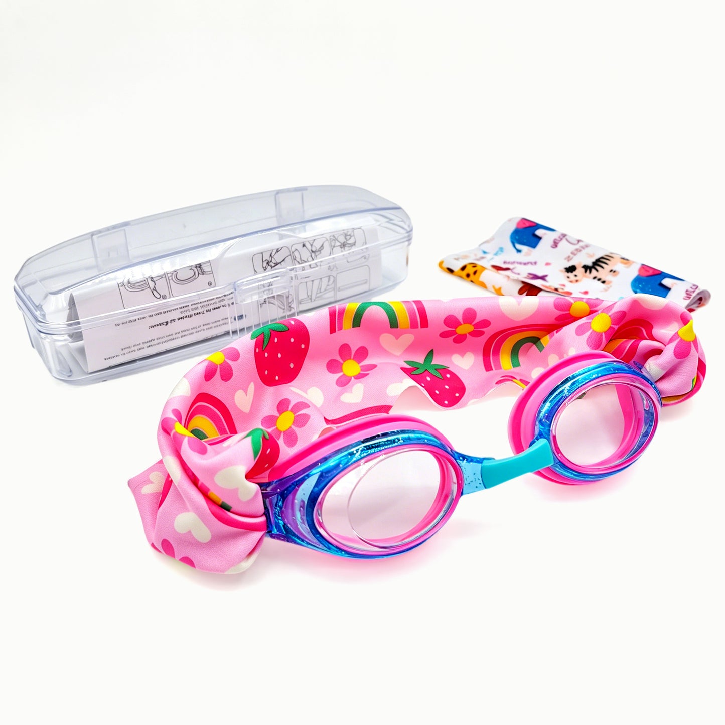 EasyStrap kids swim goggles in blue pink with strawberry rainbow fabric strap, bonus animal friends strap, hard case, and user manual included