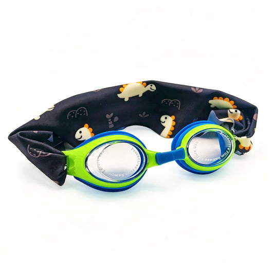 EasyStrap kids swim goggles in blue green  with soft dino adventure fabric strap for easy on and off