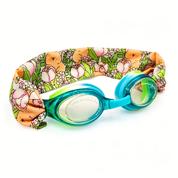 EasyStrap kids swim goggles in aqua with soft floral teddy fabric strap for easy on and off