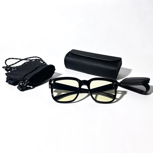 Glossy black fit-over night driving glasses with visor clip, protective storage box and microfiber storage pouch