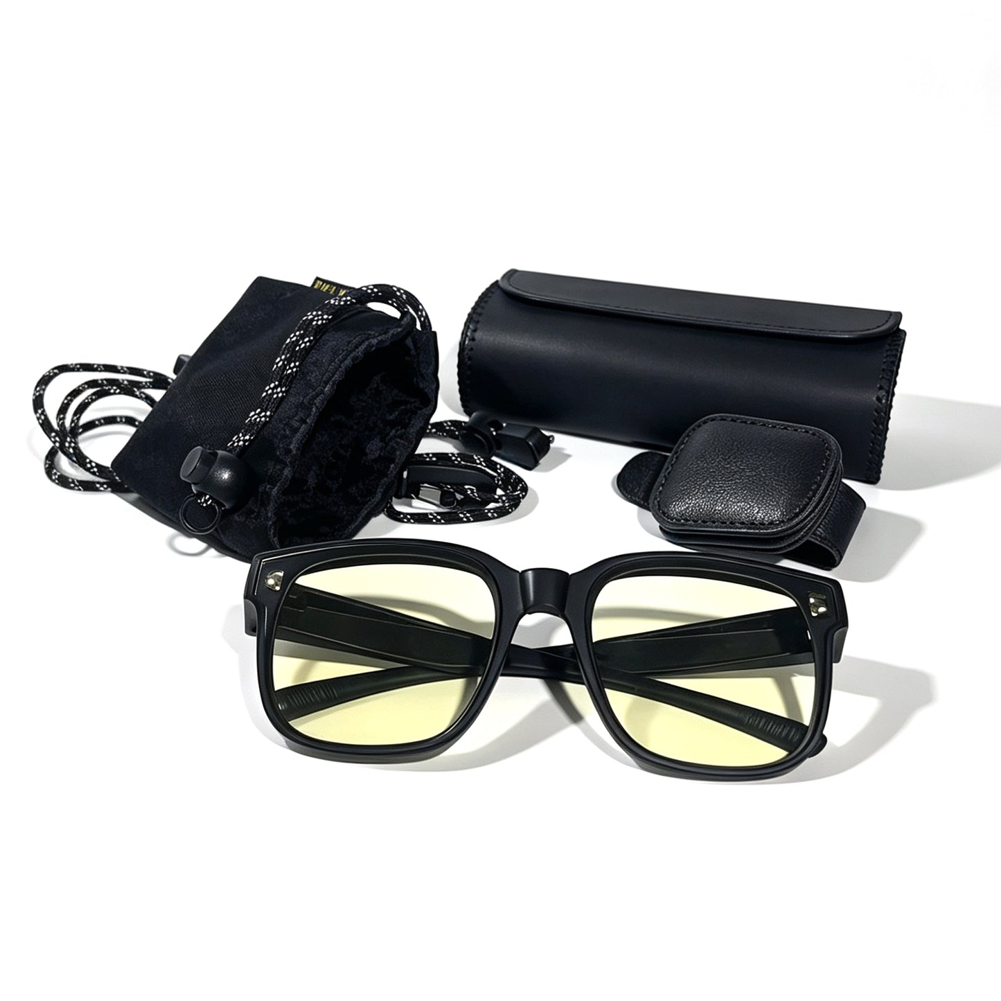 Matte black fit-over night driving glasses with visor clip, protective storage box and microfiber storage pouch