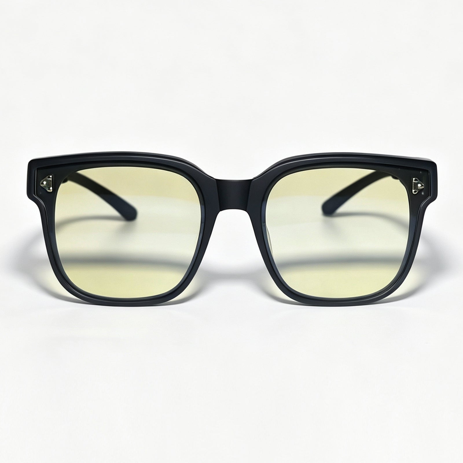 Front view of matte black fit-over night driving glasses with light yellow lenses